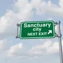 Will at least 3 US "Sanctuary Cities" officially lose federal law enforcement funding by April 1, 2026?