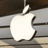 Will Apple be reported in talks to buy a film/TV studio or content library before 2028?