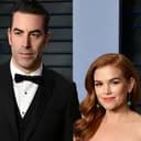 Sacha Baron Cohen or Isla Fisher, who will be seen first with a new partner in public?
