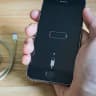 Will Apple settle the UK iPhone 'batterygate' class action (Gutmann v Apple) by December 31, 2027?
