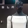 What starting price will Tesla first announce for an externally sold Optimus robot?